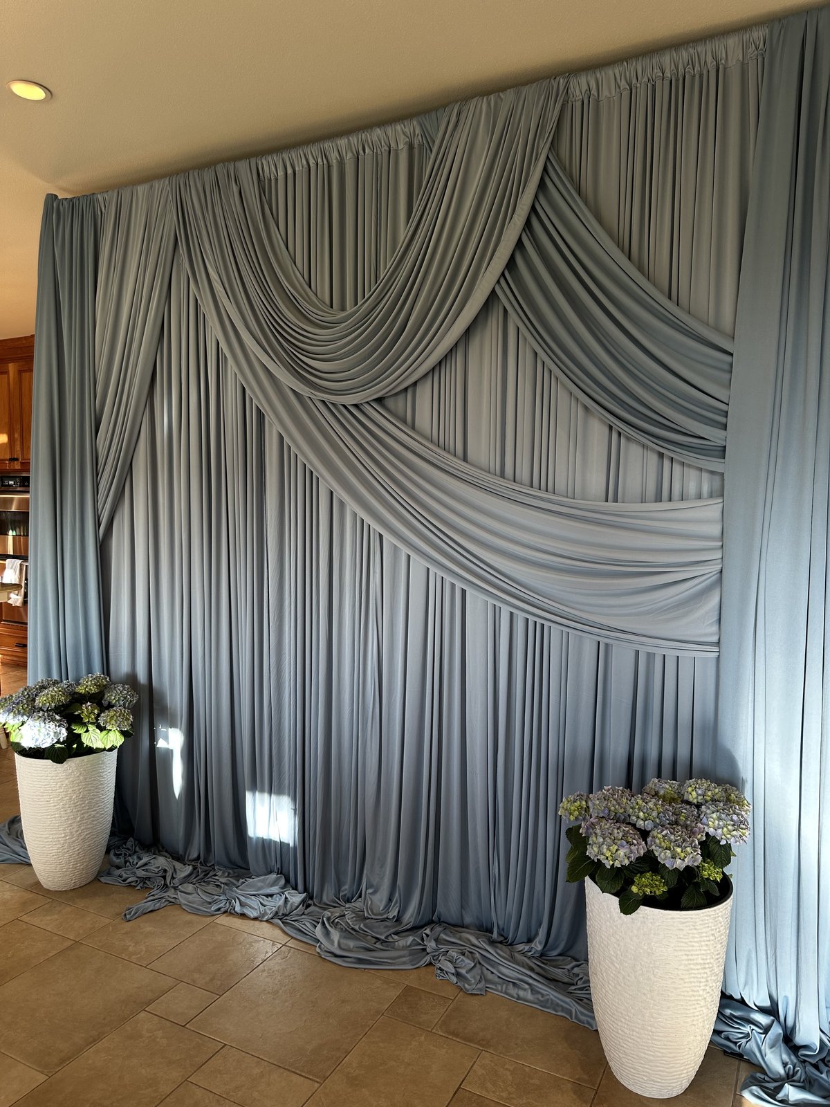 Dusty blue draping backdrop installation Salem Oregon